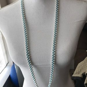 Triple strand blue and white pearl beaded necklace